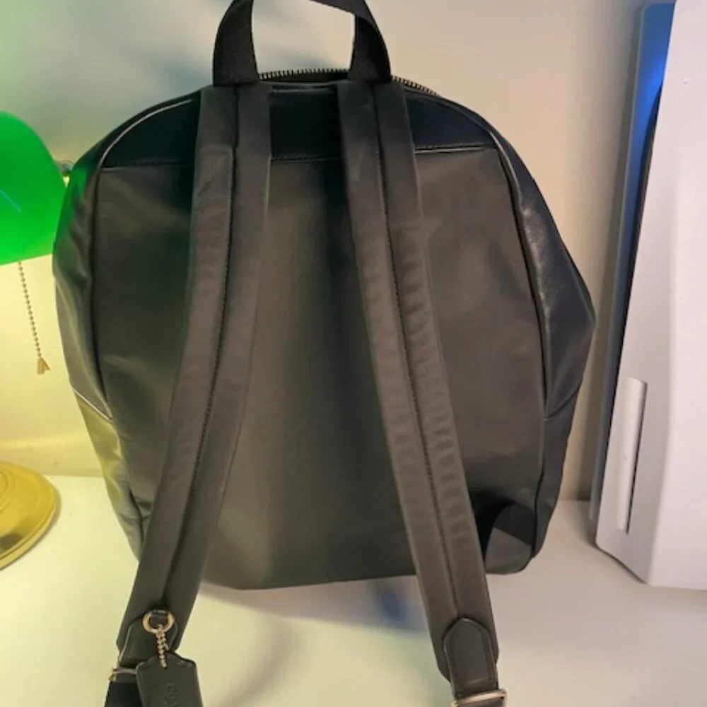 Coach Backpack mutt pocket black and brown with gold zippers